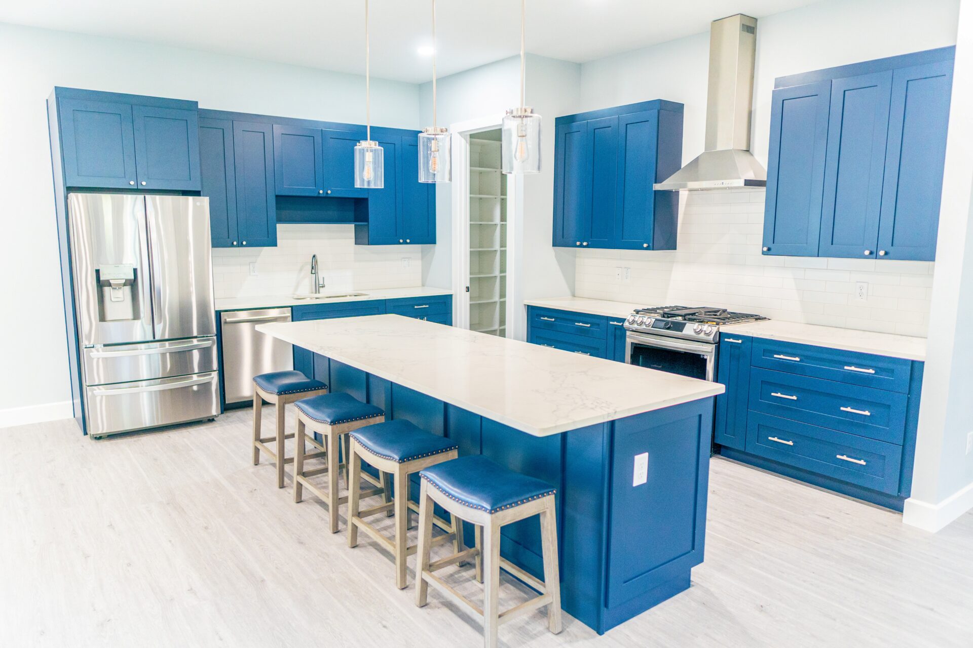 Kitchen with blue chairs